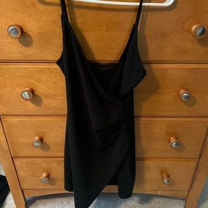 A black fitted cocktail dress